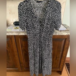 MIDI length nobody’s child dress.